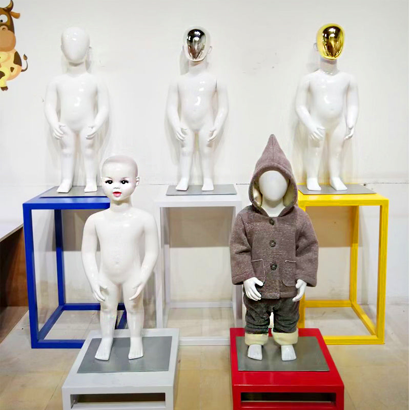High-quality plastic display mannequins for children's clothing stores, featuring fair-skinned, attractive, and stylized faces; suitable for ages 2 to 10.